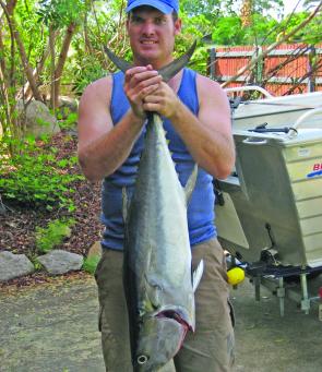 Author holding a typical Bay longtail tuna, caught on a soft plastic.